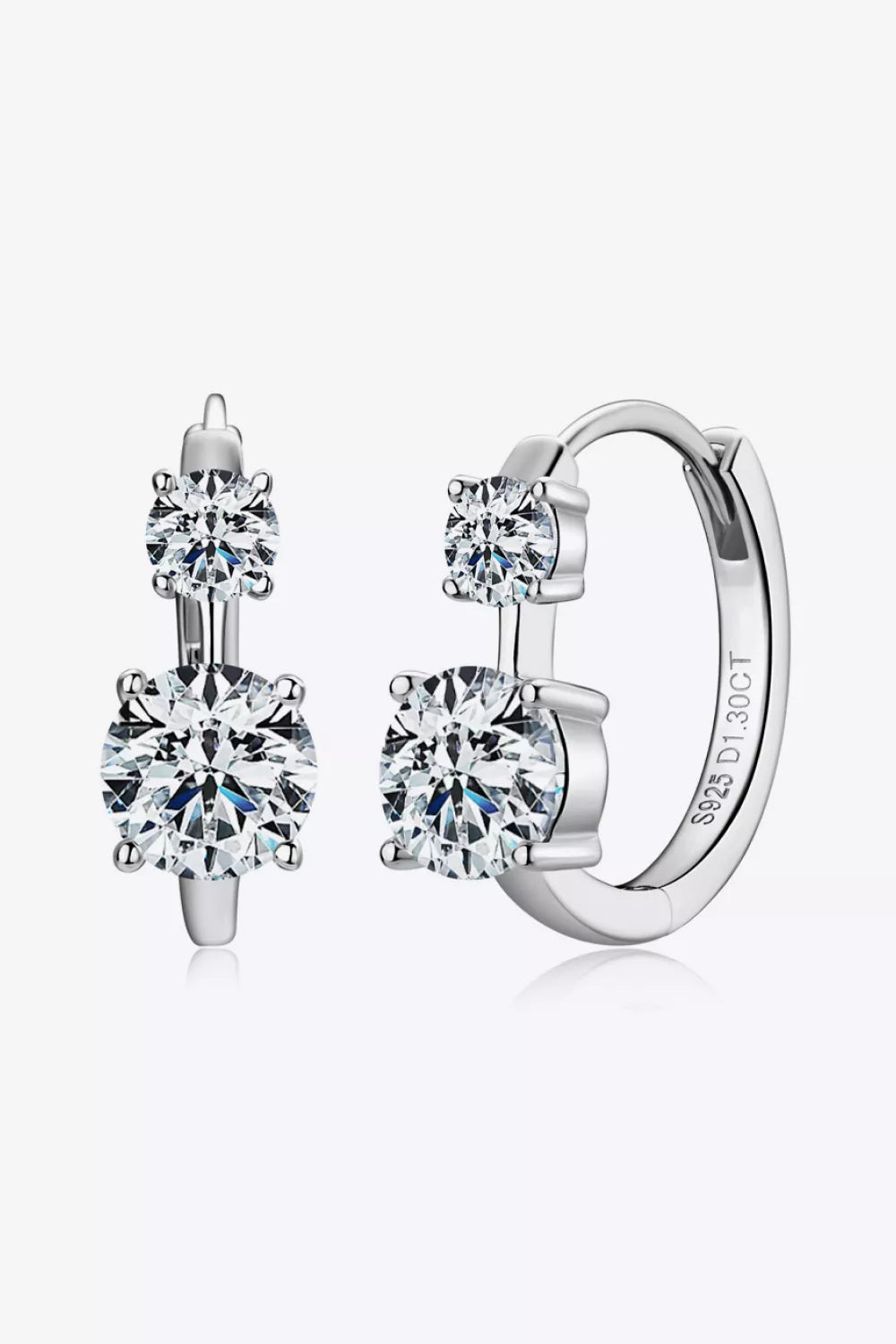 Sterling silver moissanite earrings with 1.3 carats, featuring sparkling round-cut stones in a stylish dangle design.