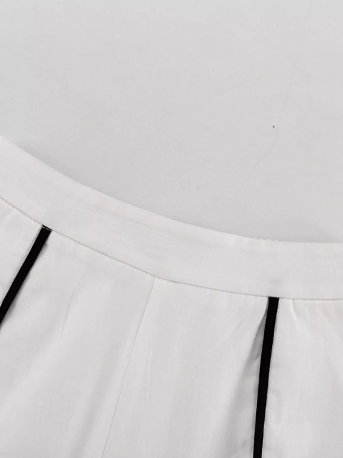 Contrast trim sleeveless top and wide-leg pants set by Plush Fashion Hub, featuring stylish two-piece outfit with modern design.
