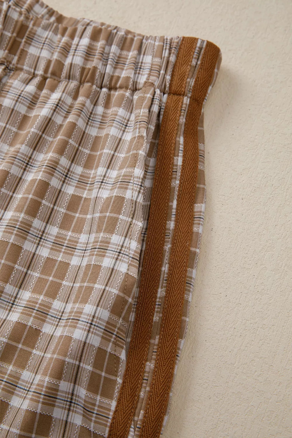 Casual plaid print pants with tie detail from Trendsi, featuring a relaxed fit and stylish design.