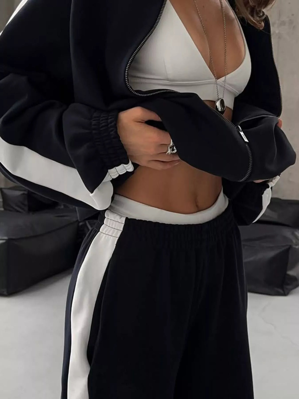 Plush Fashion Hub zip-up long sleeve tracksuit set with comfortable fabric and stylish design, suitable for casual wear.