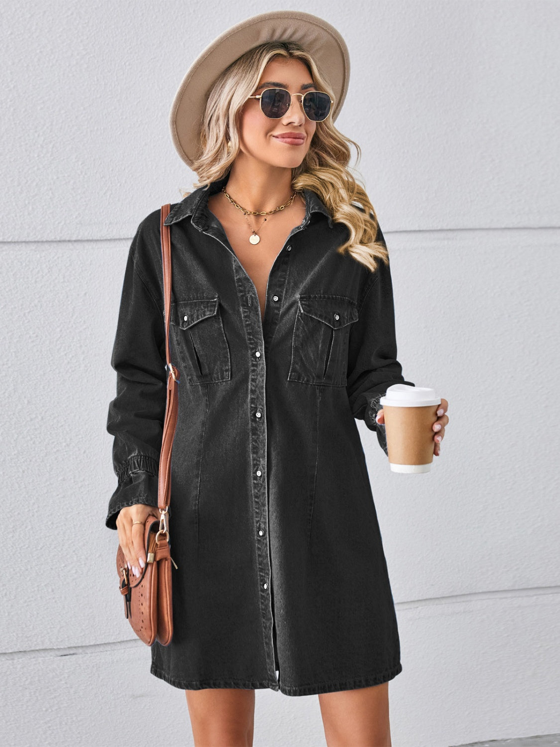 Plush Fashion Hub pocketed dropped shoulder mini denim dress displayed on a hanger with a casual, stylish look.