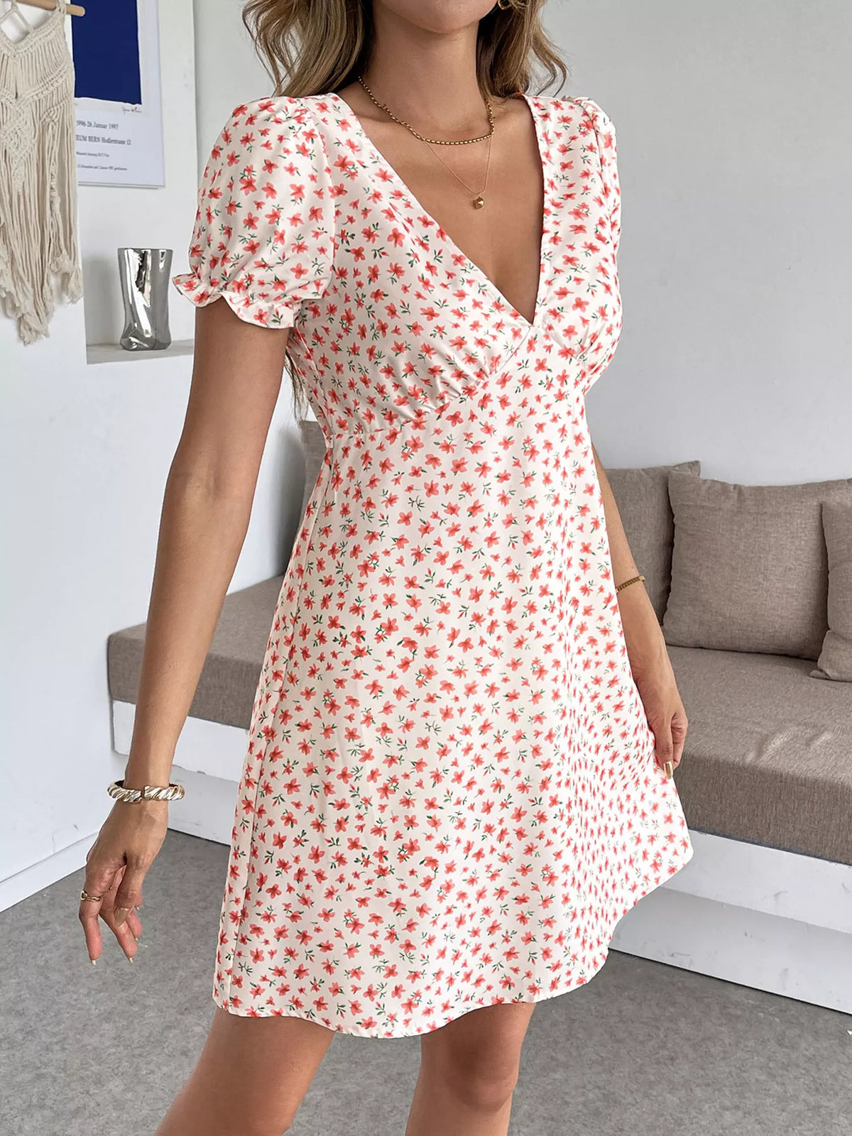 Floral print V-neck puff sleeve mini summer dress for women by Plush Fashion Hub, featuring a lightweight, feminine design.