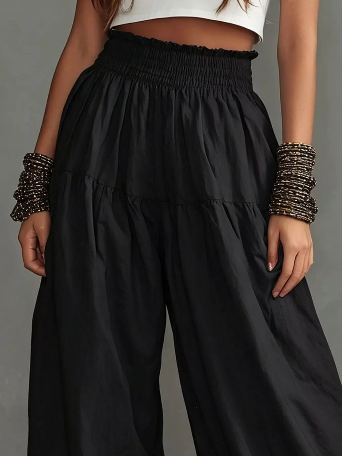 Plus size full smocked ruffle hem wide-leg pants by Plush Fashion Hub, featuring a flowy fit and ruffled detailing at the hem.