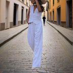 Women’s V-neck button-front vest and high-waist pants casualwear set by FitiqueFit, featuring a stylish, coordinated look.
