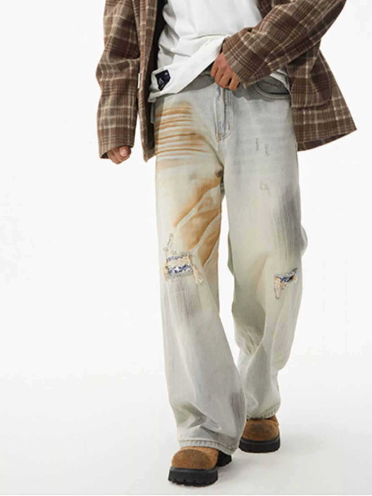 Men's distressed wide leg jeans by Plush Fashion Hub featuring a relaxed fit and rugged, faded denim style.