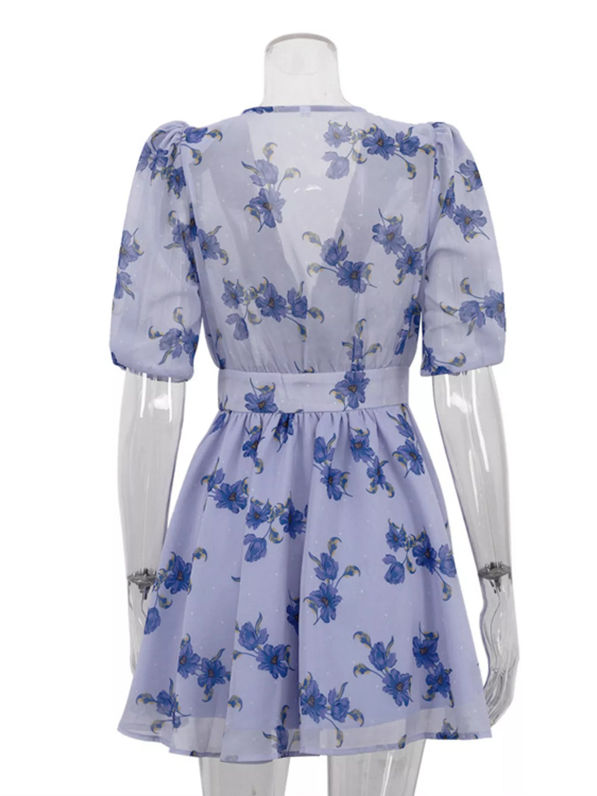 Floral puff sleeve mini dress by Plush Fashion Hub featuring a vibrant floral pattern and puffed short sleeves.