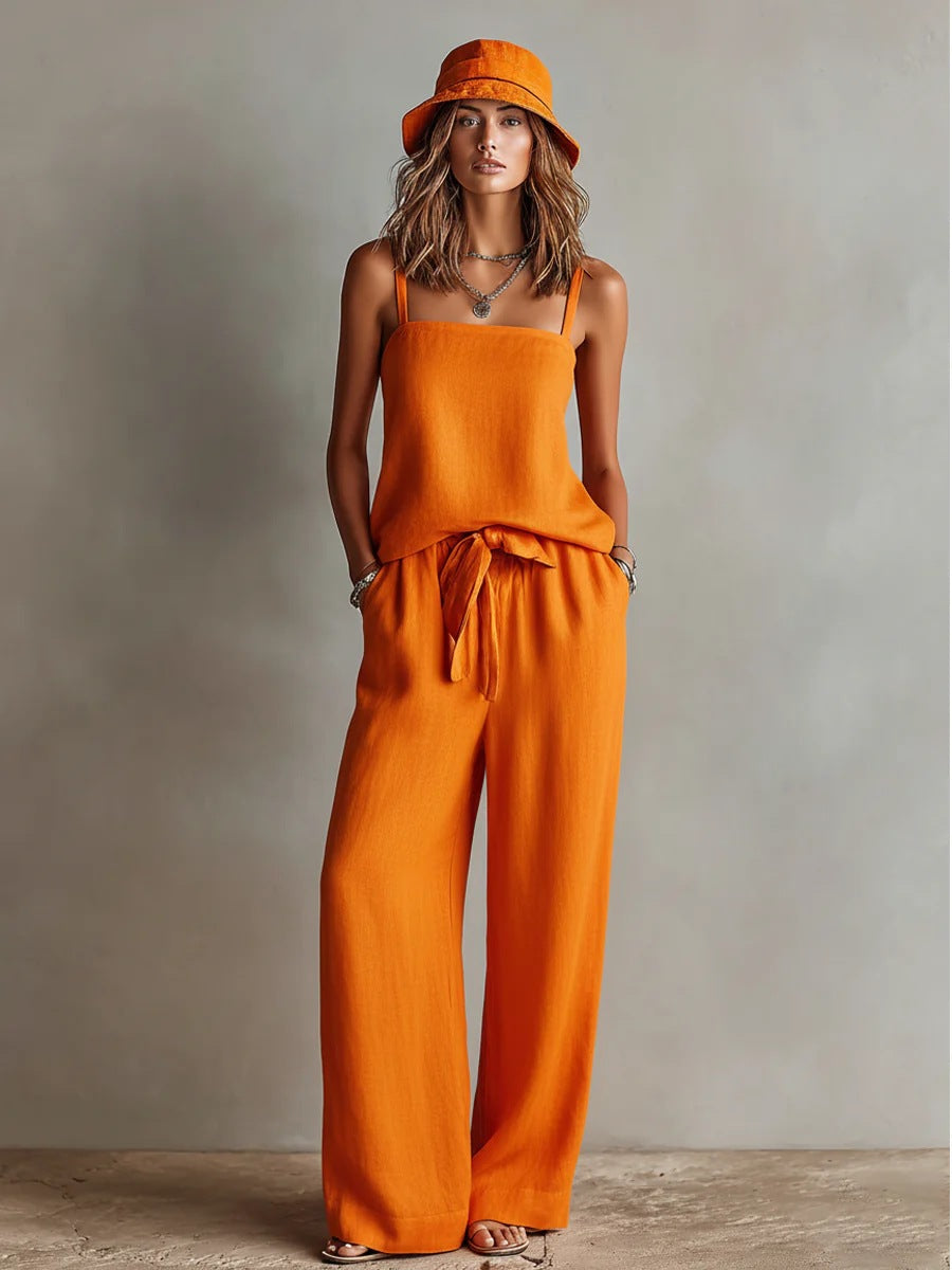 Women's casual two-piece set by FitiqueFit featuring a spaghetti strap cami top and wide-leg pants in lightweight fabric.