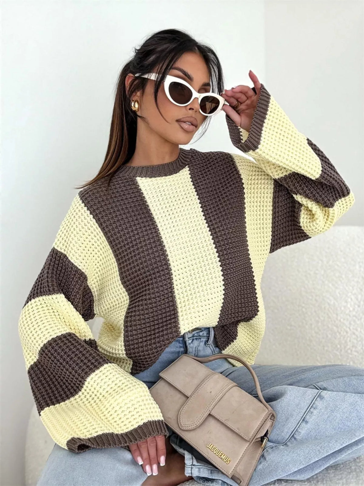 Color block long sleeve sweater from Trendsi featuring bold, contrasting colors and a comfortable, casual fit.