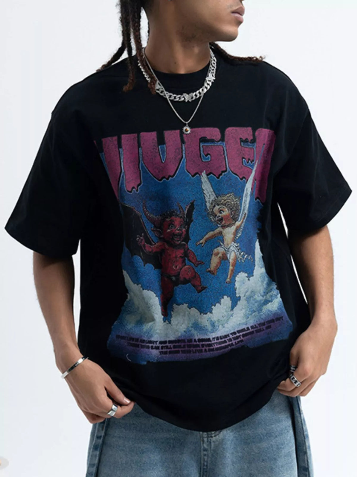 Men's graphic round neck short sleeve T-shirt by Trendsi, featuring a bold design on soft cotton fabric.