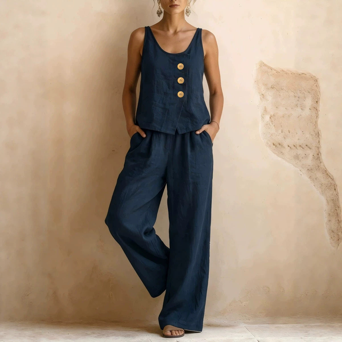 Women's sleeveless tank top and pants casualwear two-piece set by FitiqueFit, featuring a comfortable and stylish matching outfit.