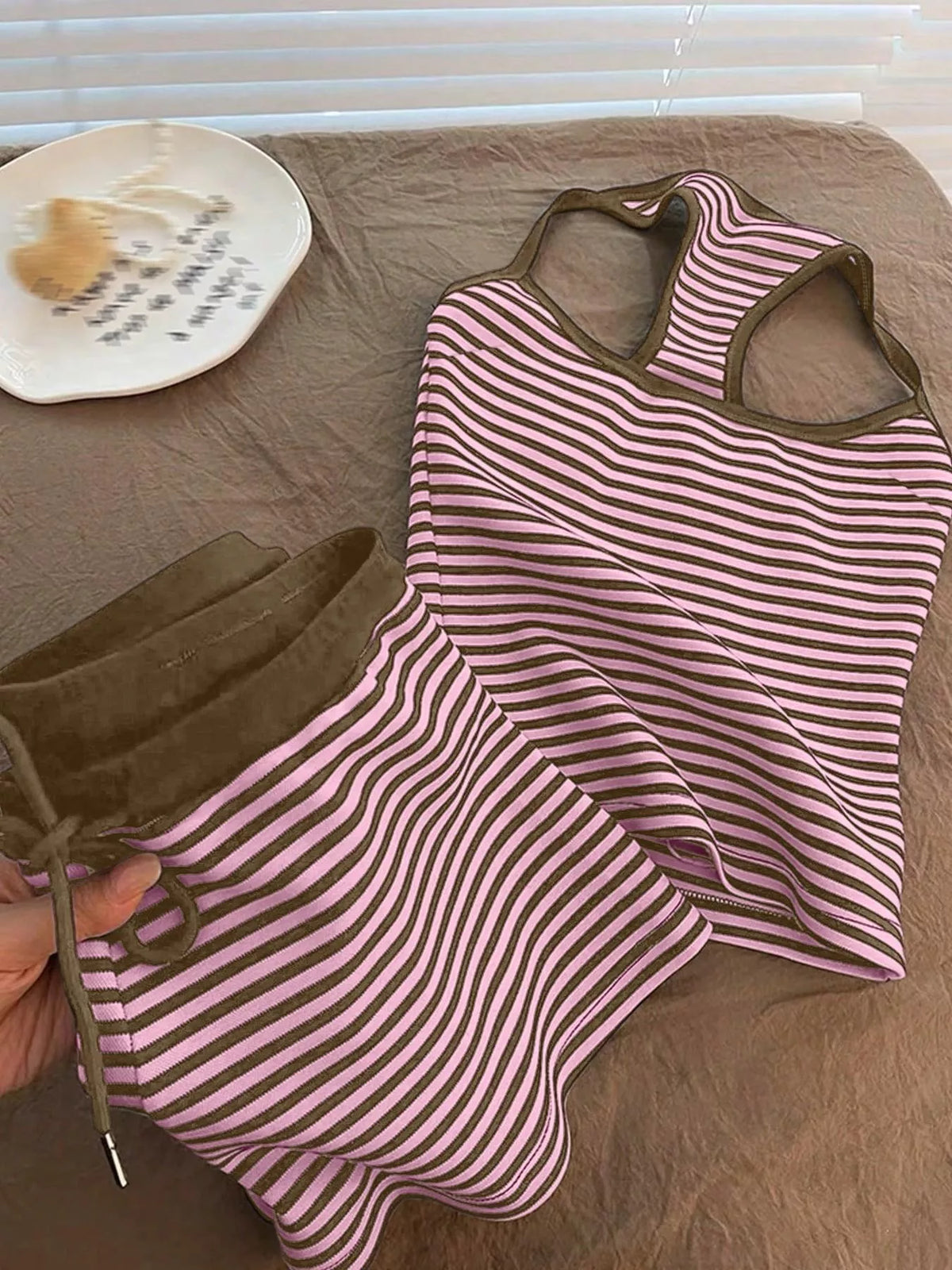 Striped tank top and shorts set by Plush Fashion Hub, featuring a casual summer outfit with a sleeveless top and matching shorts.