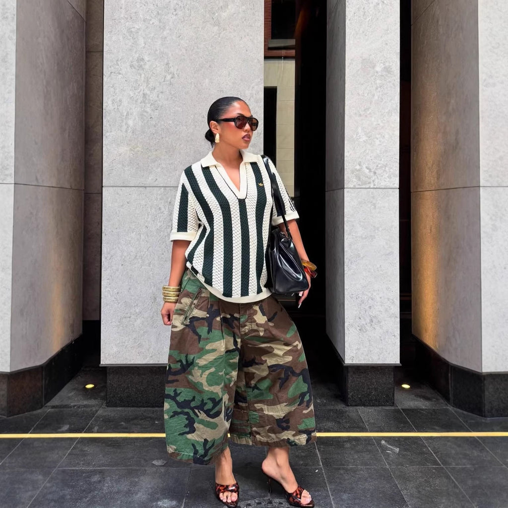 Women's wide-leg cargo pants with zipper and button details, from Plush Fashion Hub, featuring a relaxed fit and utility style.