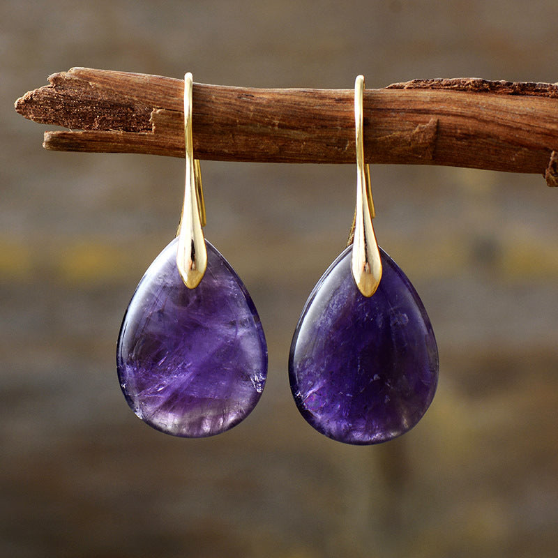 Crystal dangle earrings from Plush Fashion Hub featuring sparkling crystal drops and stylish design for elegant fashion accessories.