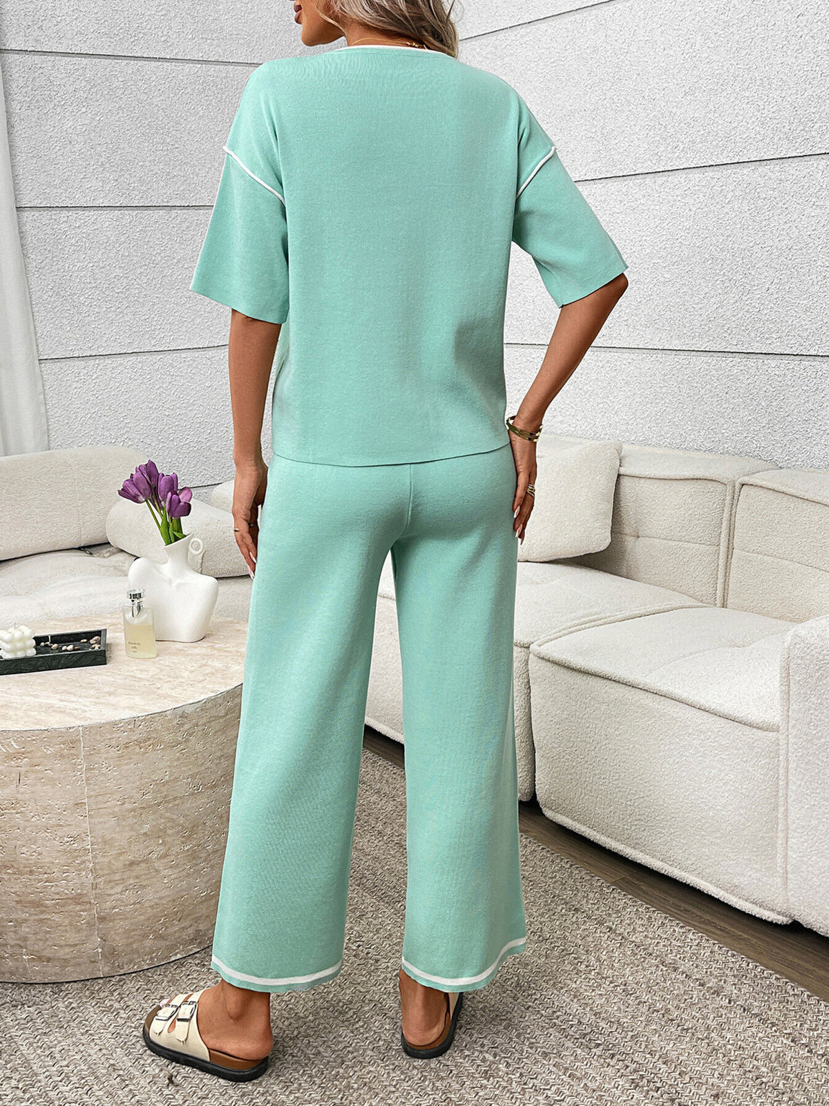 Women’s casual two-piece lounge set with round neck top and drawstring pants from Plush Fashion Hub, shown in a comfortable, relaxed fit.