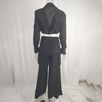 Plus size women's wide leg elegant pant set by FitiqueFit, featuring a casual, stylish two-piece outfit with flowing wide-leg pants and matching top.
