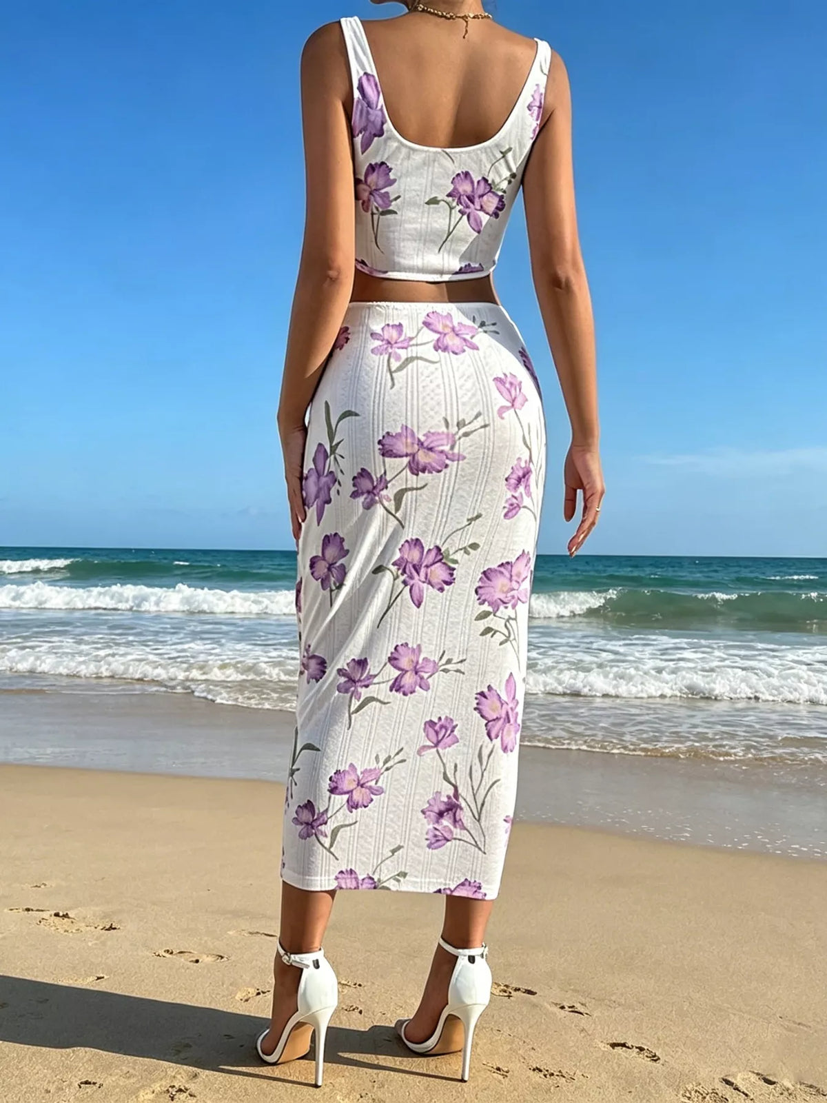 Floral print top and bodycon skirt set by Plush Fashion Hub, featuring vibrant floral patterns and fitted silhouette.