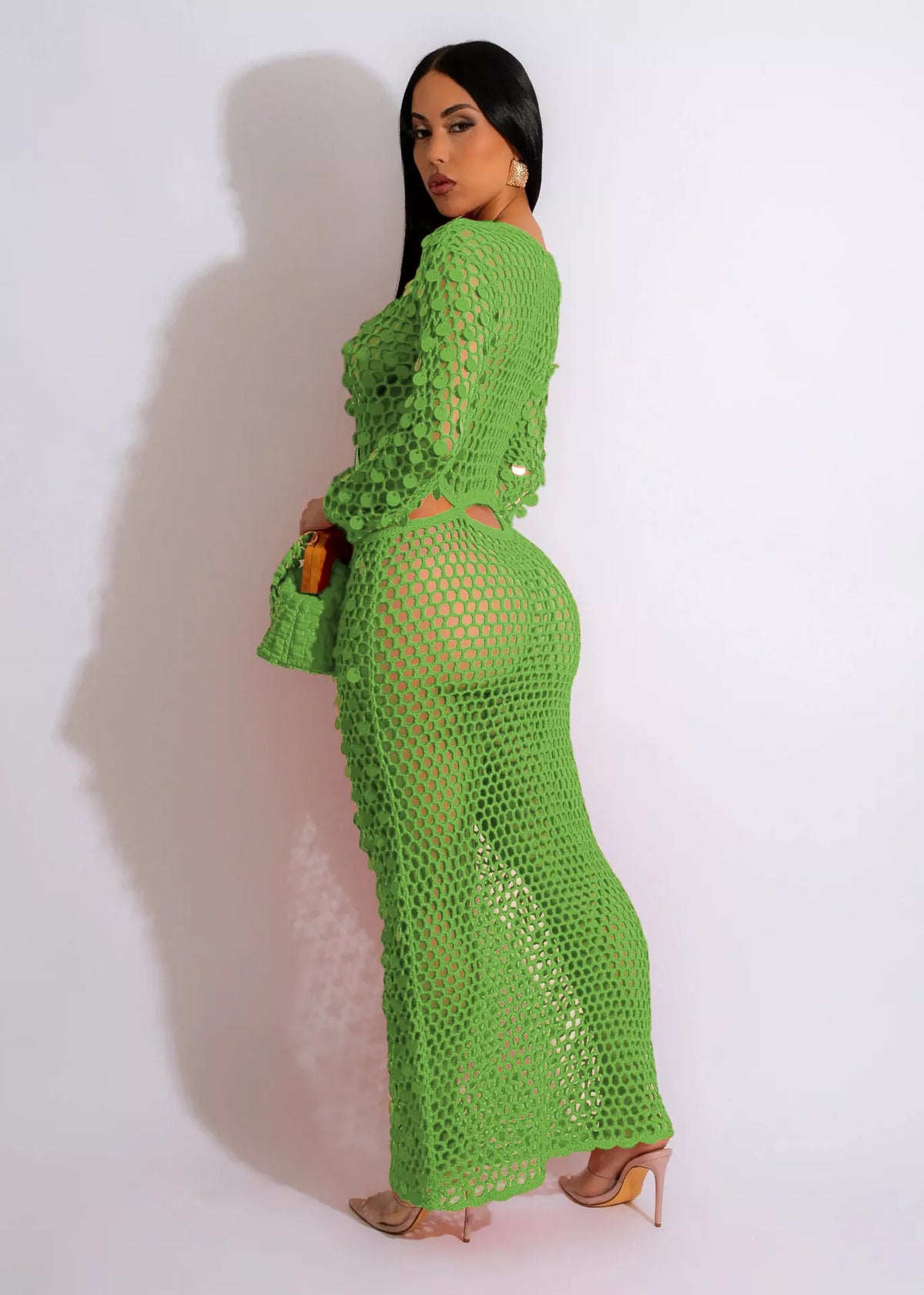 Plush Fashion Hub sequin mesh cutout maxi dress featuring a fitted silhouette and stylish design for elegant occasions.