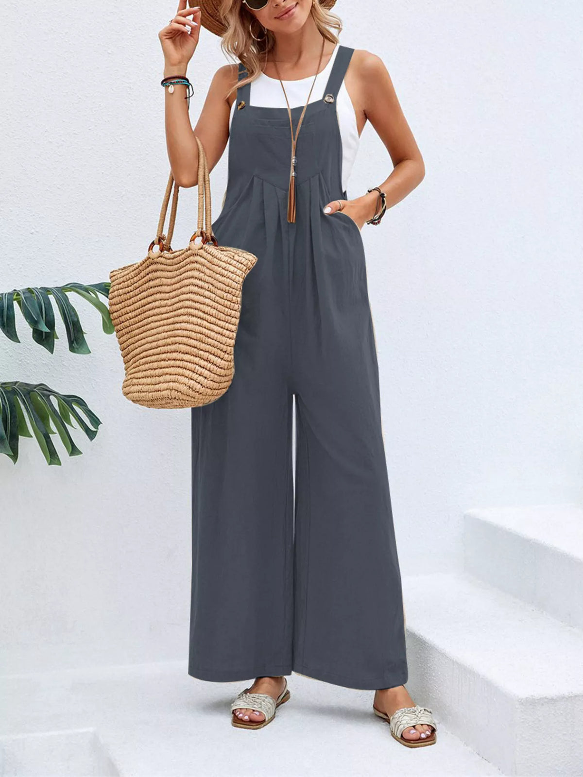 Plus size casual wide-leg jumpsuit with pockets from Plush Fashion Hub, perfect for comfortable everyday wear.