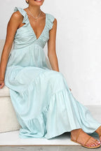 Women's 100% cotton ruffled V-neck tiered midi dress featuring a flowy design and feminine ruffle details.