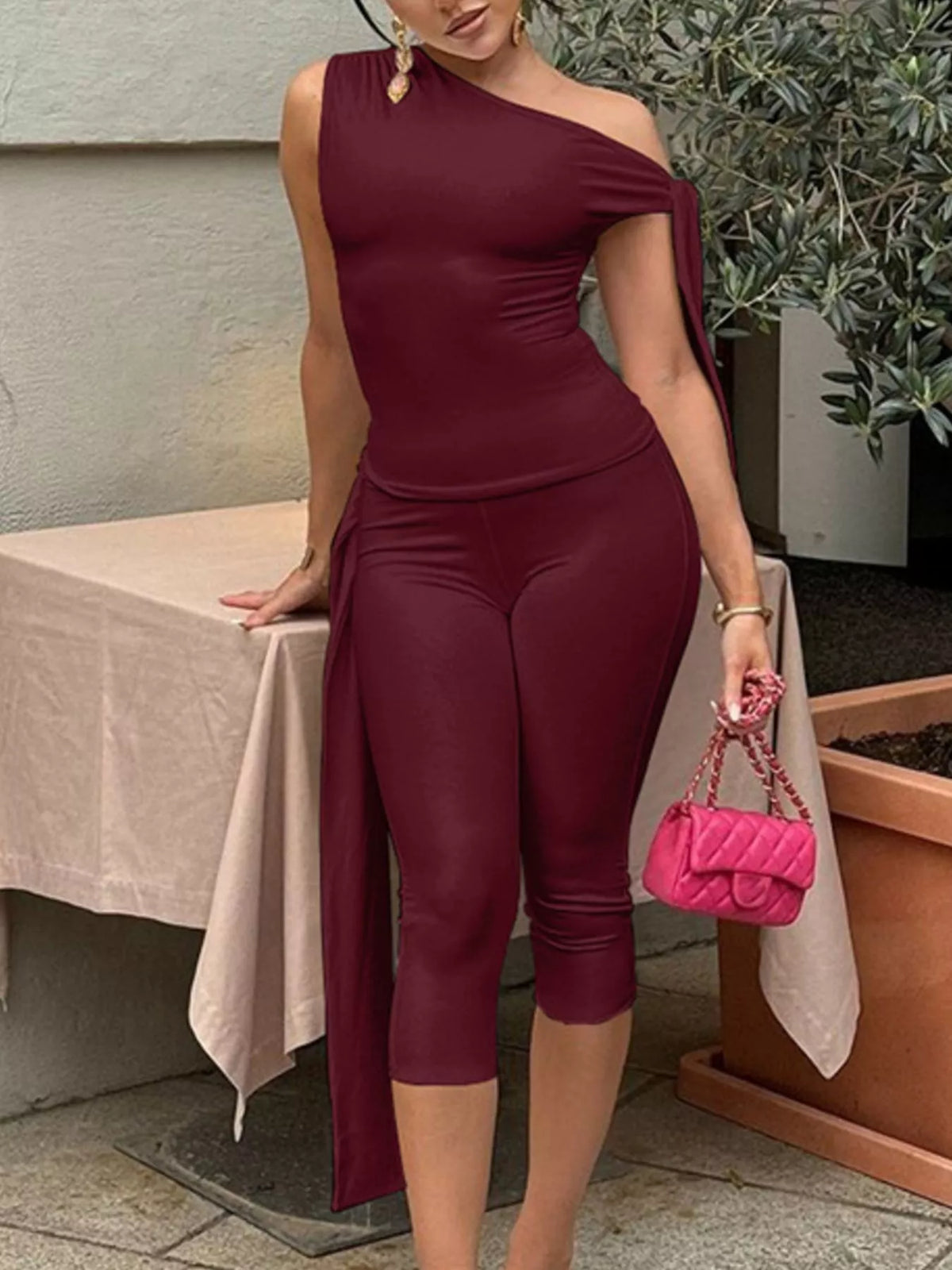 Asymmetrical one-shoulder top and matching capris set by Plush Fashion Hub, featuring a stylish, modern design.