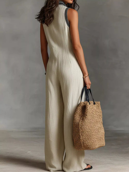 Plus size sleeveless wide-leg jumpsuit by Trendsi, full-length view showing relaxed fit and stylish design.