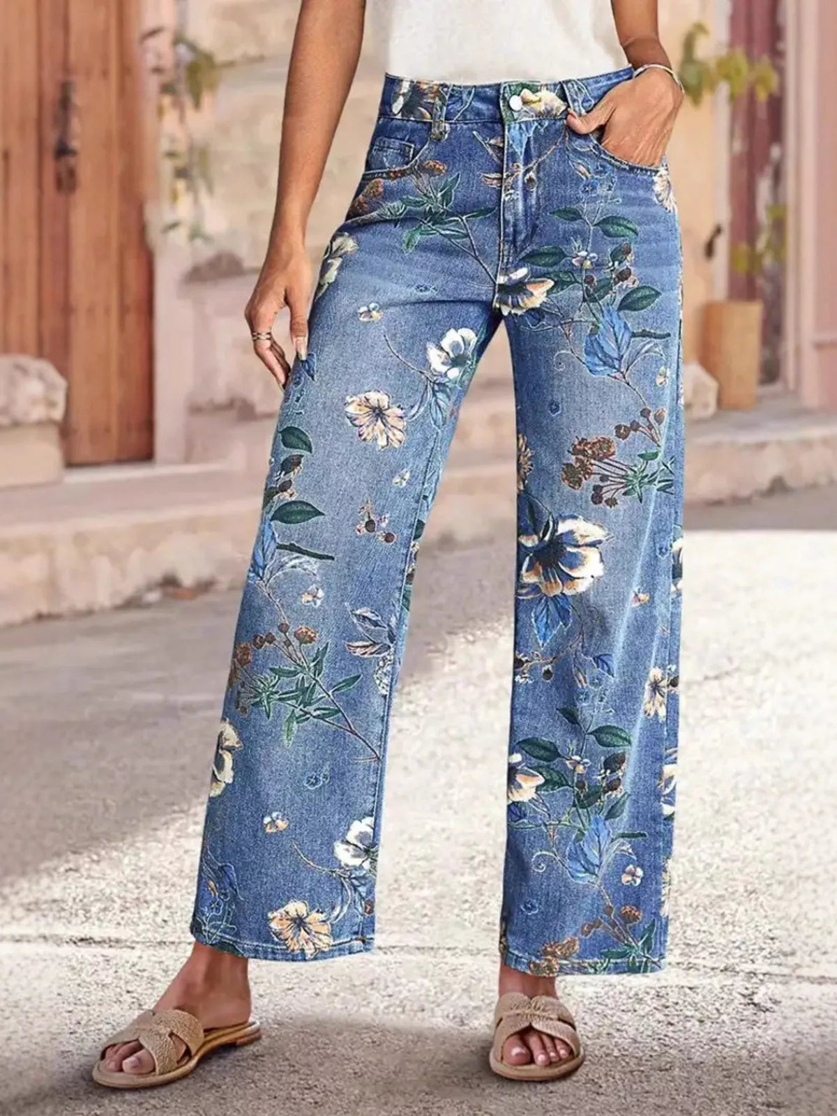 Floral print wide leg jeans from Plush Fashion Hub featuring a relaxed fit and vibrant floral design, perfect for casual wear.
