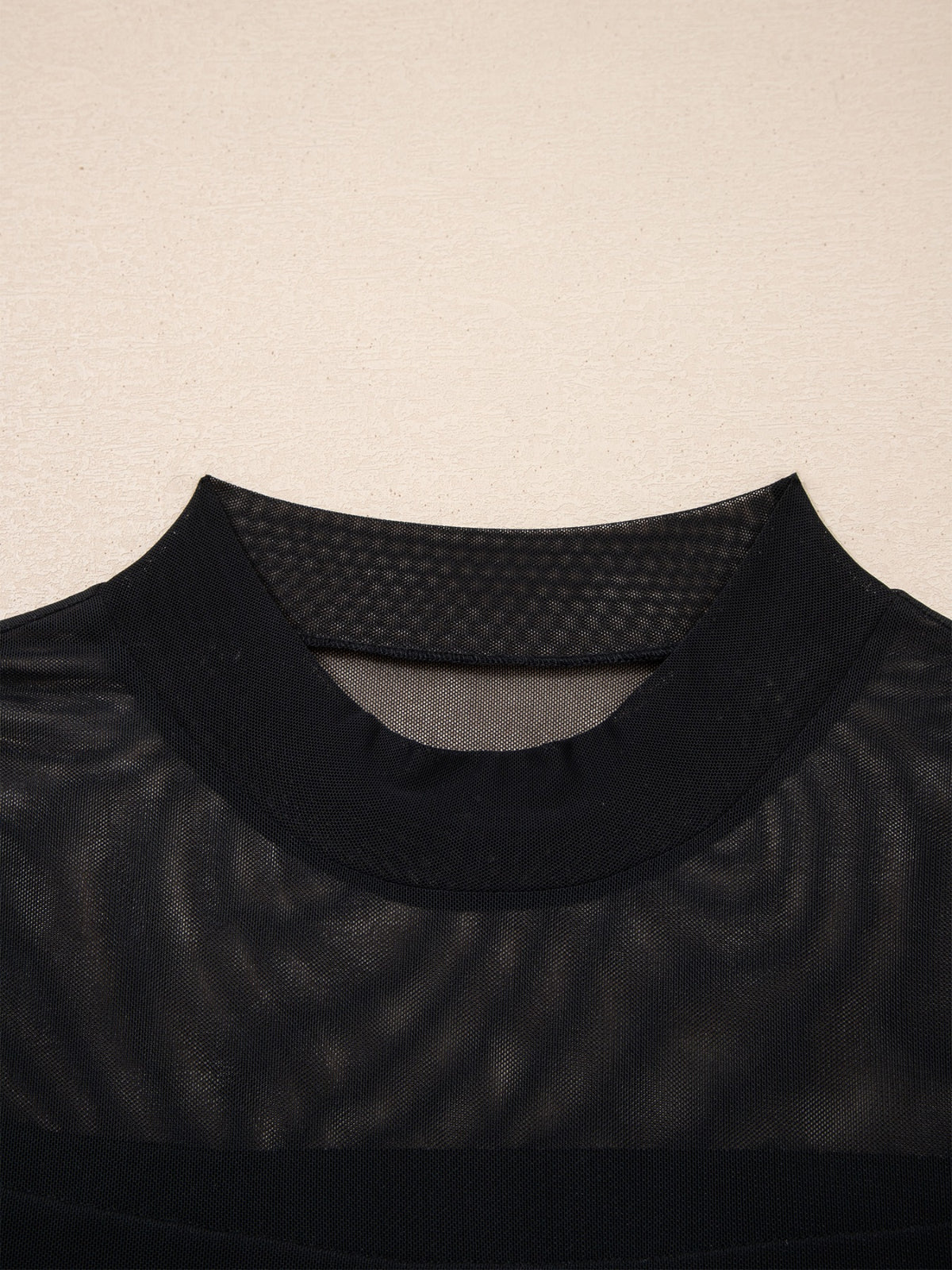 Women's sheer mesh patchwork cap sleeve top from Plush Fashion Hub featuring elegant layering and stylish design.
