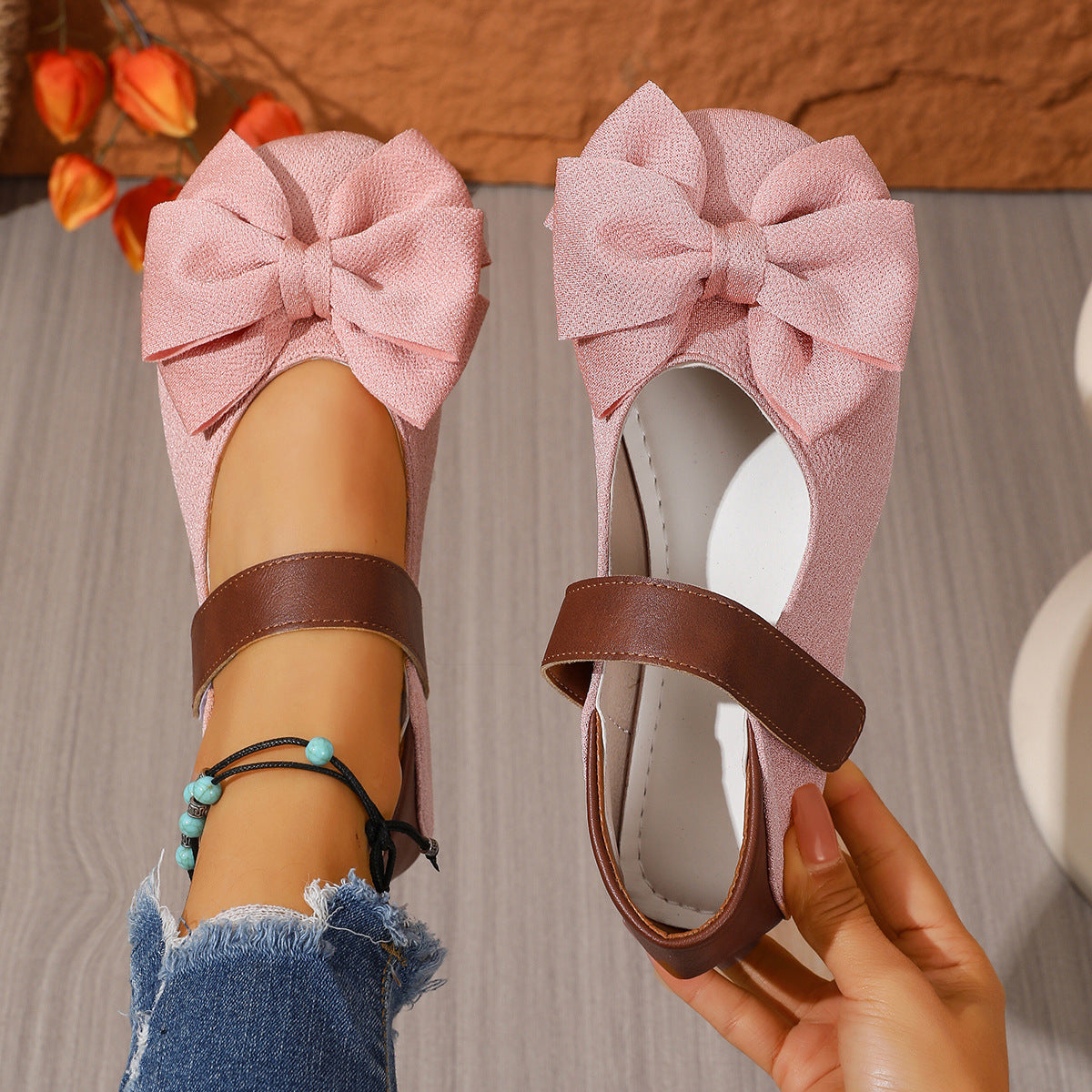 Women's vegan leather slip-on flats with round toe and chic bow by Plush Fashion Hub, featuring a comfortable and stylish design.