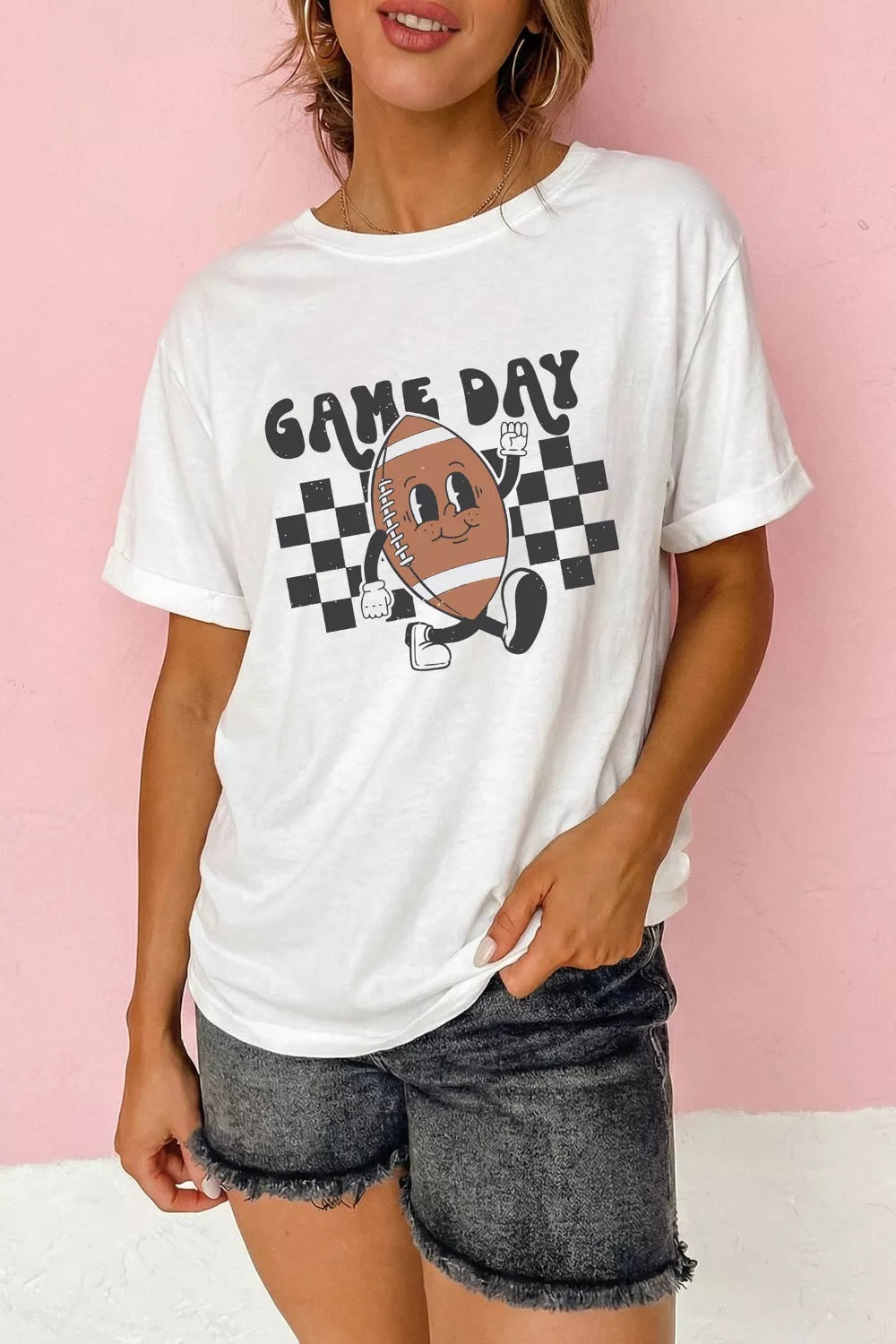Plush Fashion Hub Game Day football graphic T-shirt, casual tops with bold football design, perfect for sports fans.