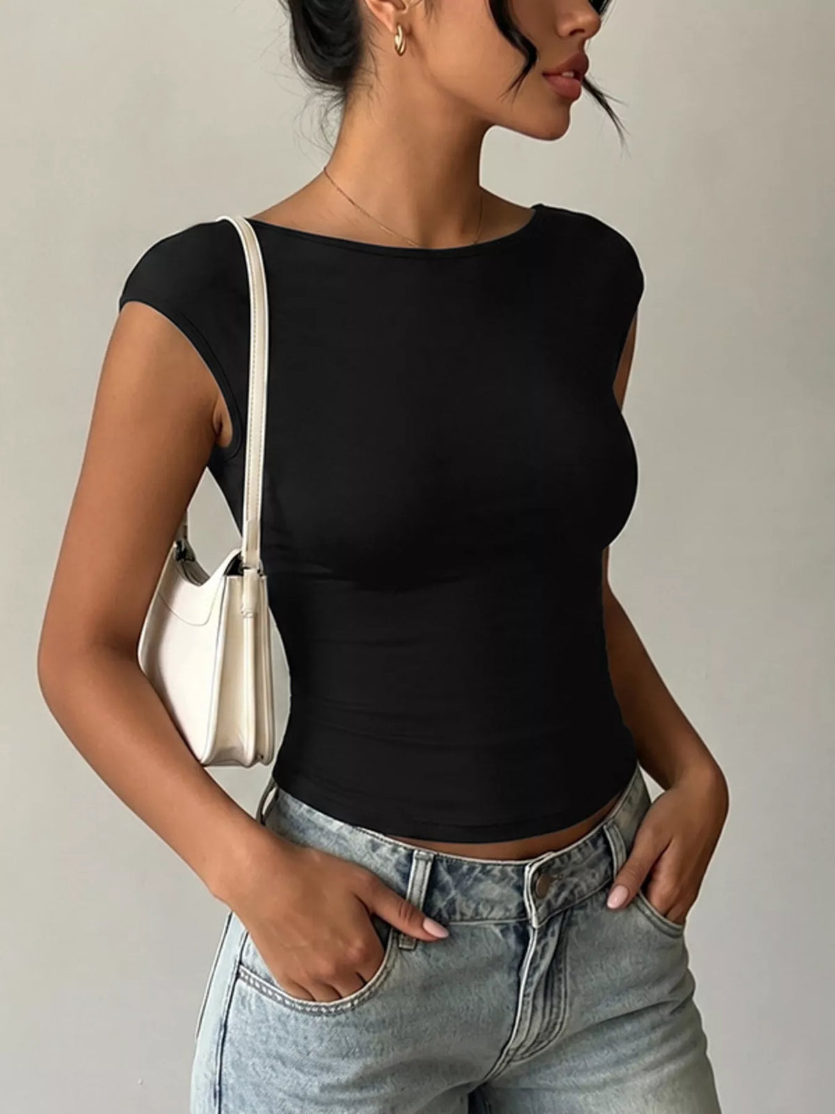 Lace detail cap sleeve t-shirt by Plush Fashion Hub, soft fabric with elegant lace accents, casual top for women.