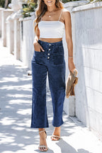Threaded Pear Mckinley wide leg cropped jeans with relaxed fit and classic denim wash, displayed on a hanger.