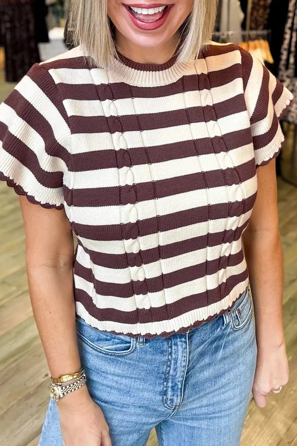 Women’s striped ribbed knit sweater with cable detail, short sleeves, from Trendsi, featuring textured cable knitting and a fitted style.
