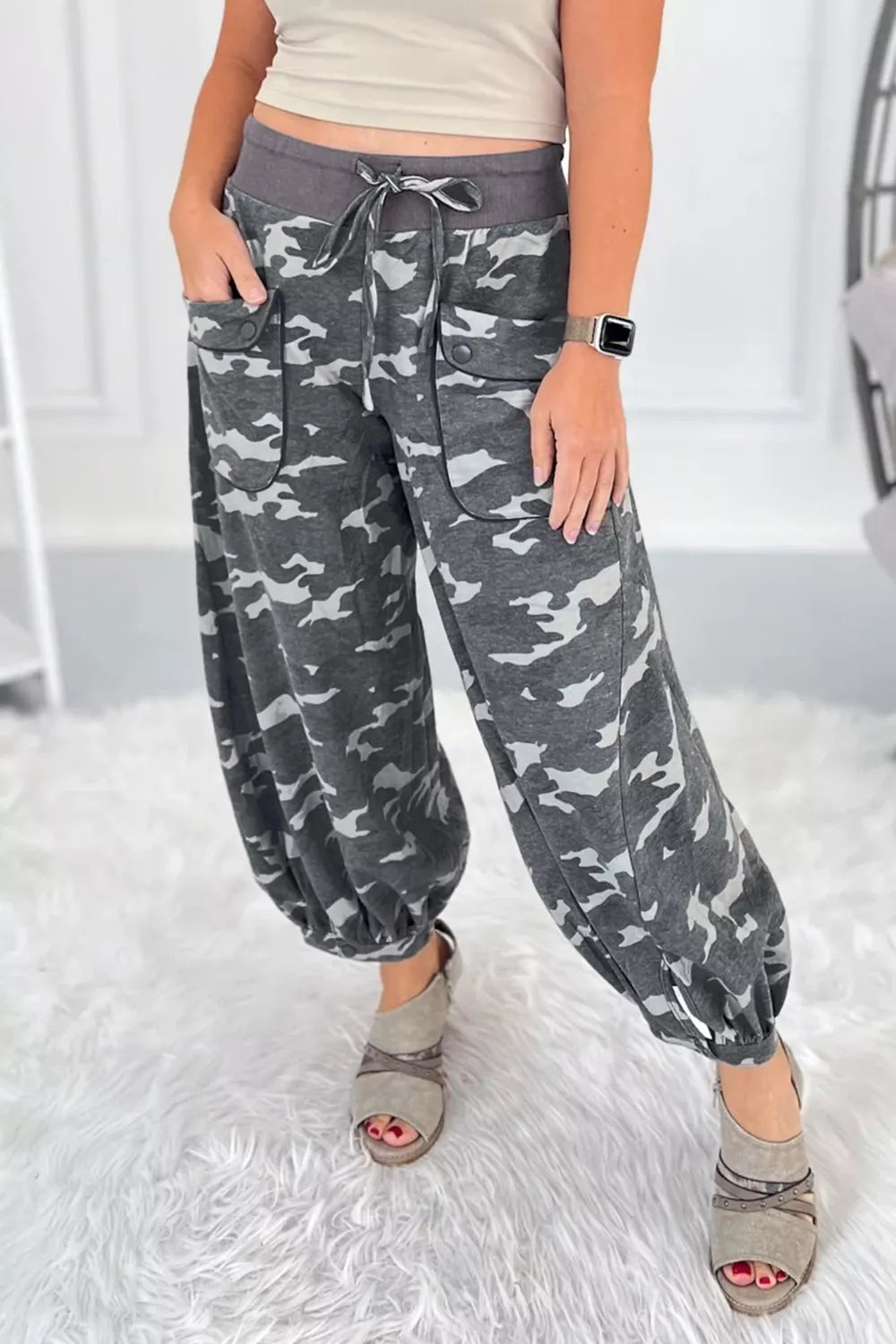Multicolour camouflage cargo barrel pants with contrast waistband and drawstring from Plush Fashion Hub, showing detailed fabric and design.