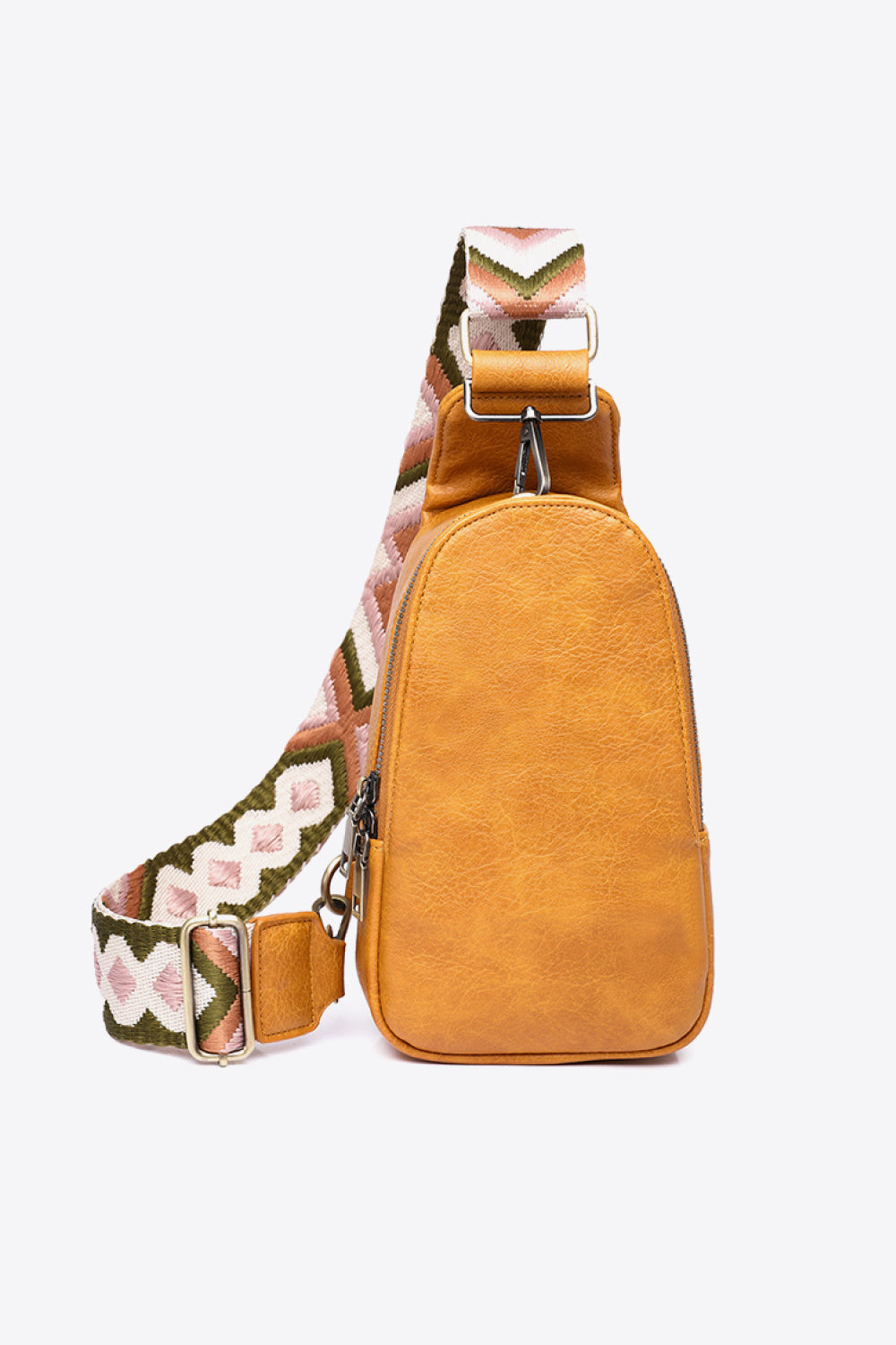 Trendsi random pattern adjustable strap PU leather sling bag with multiple compartments and stylish design.