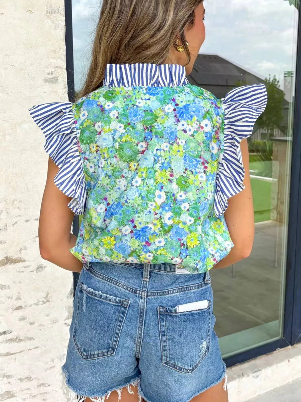 Cotton floral patchwork V-neck dress with flutter sleeves by Plush Fashion Hub, featuring a colorful floral pattern and relaxed fit.