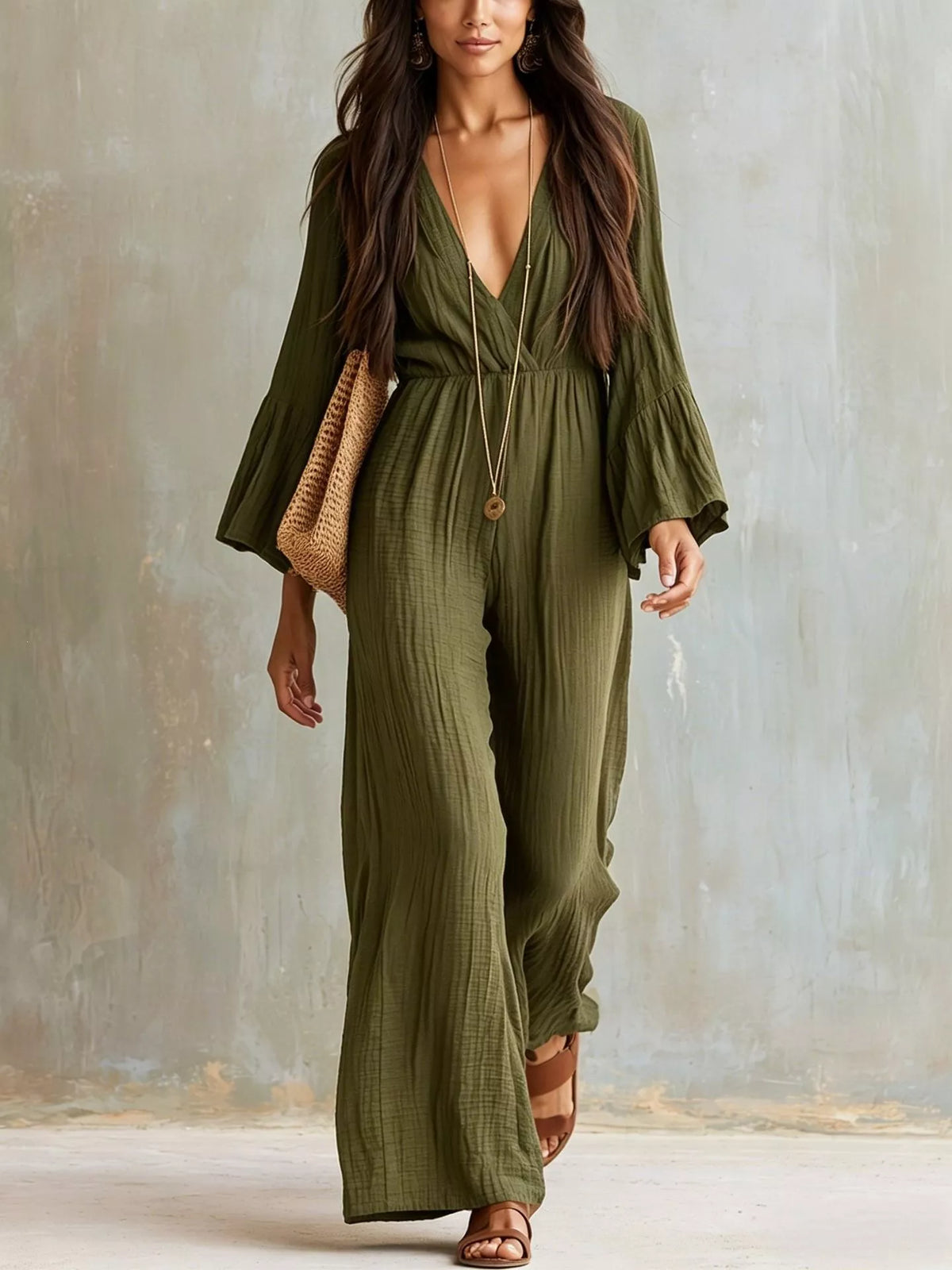 Textured flare sleeve jumpsuit for women by Trendsi, featuring a stylish design and comfortable fit, shown in the image.