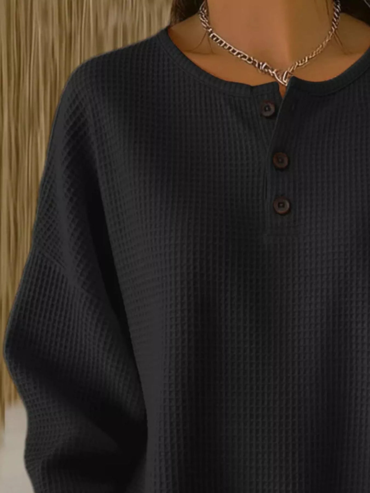 Plus size waffle knit top with button details, featuring a relaxed fit and soft fabric, from Trendsi.