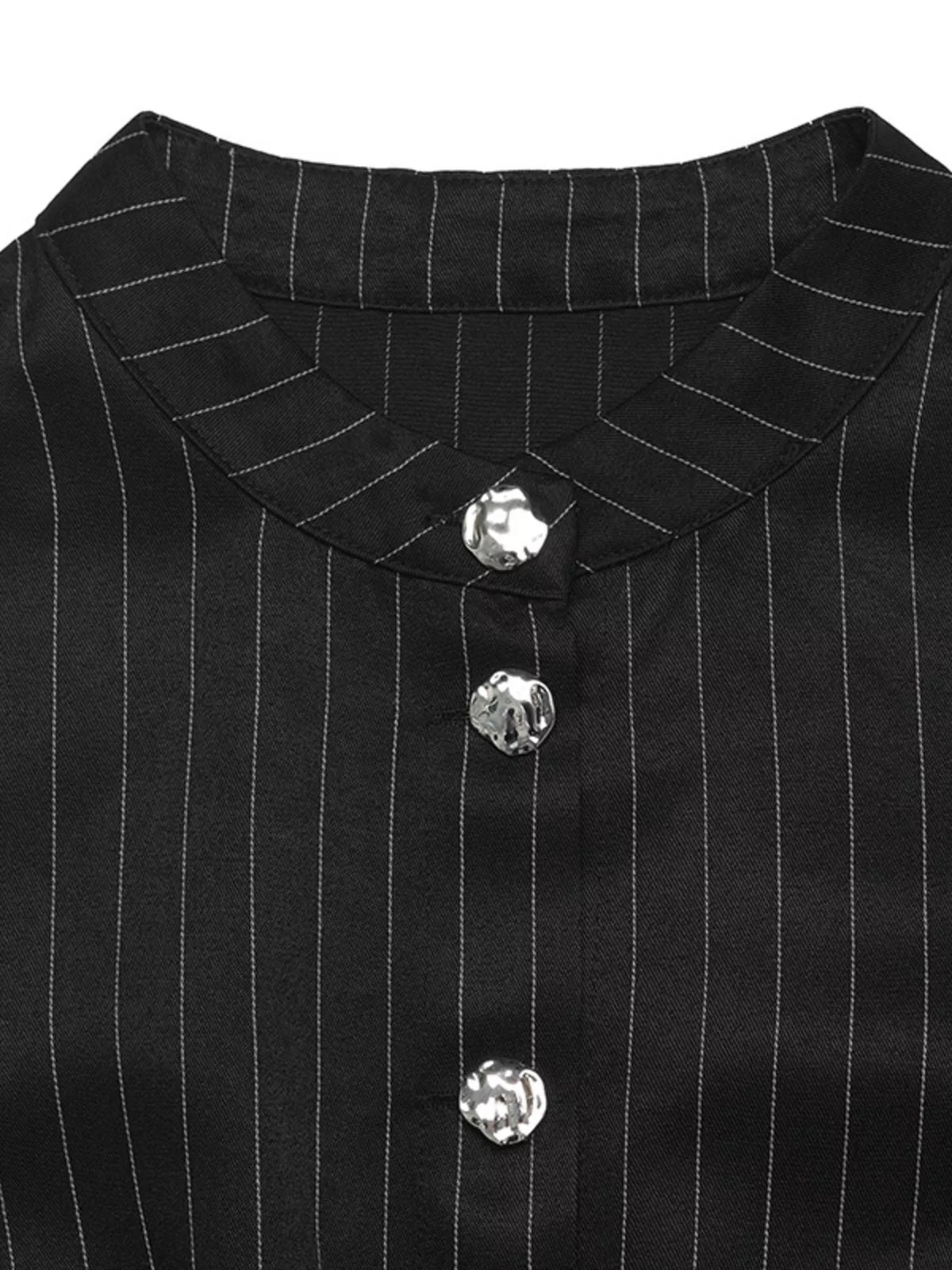 Striped long sleeve peplum blouse for women from Trendsi, featuring a fitted design and stylish pattern.