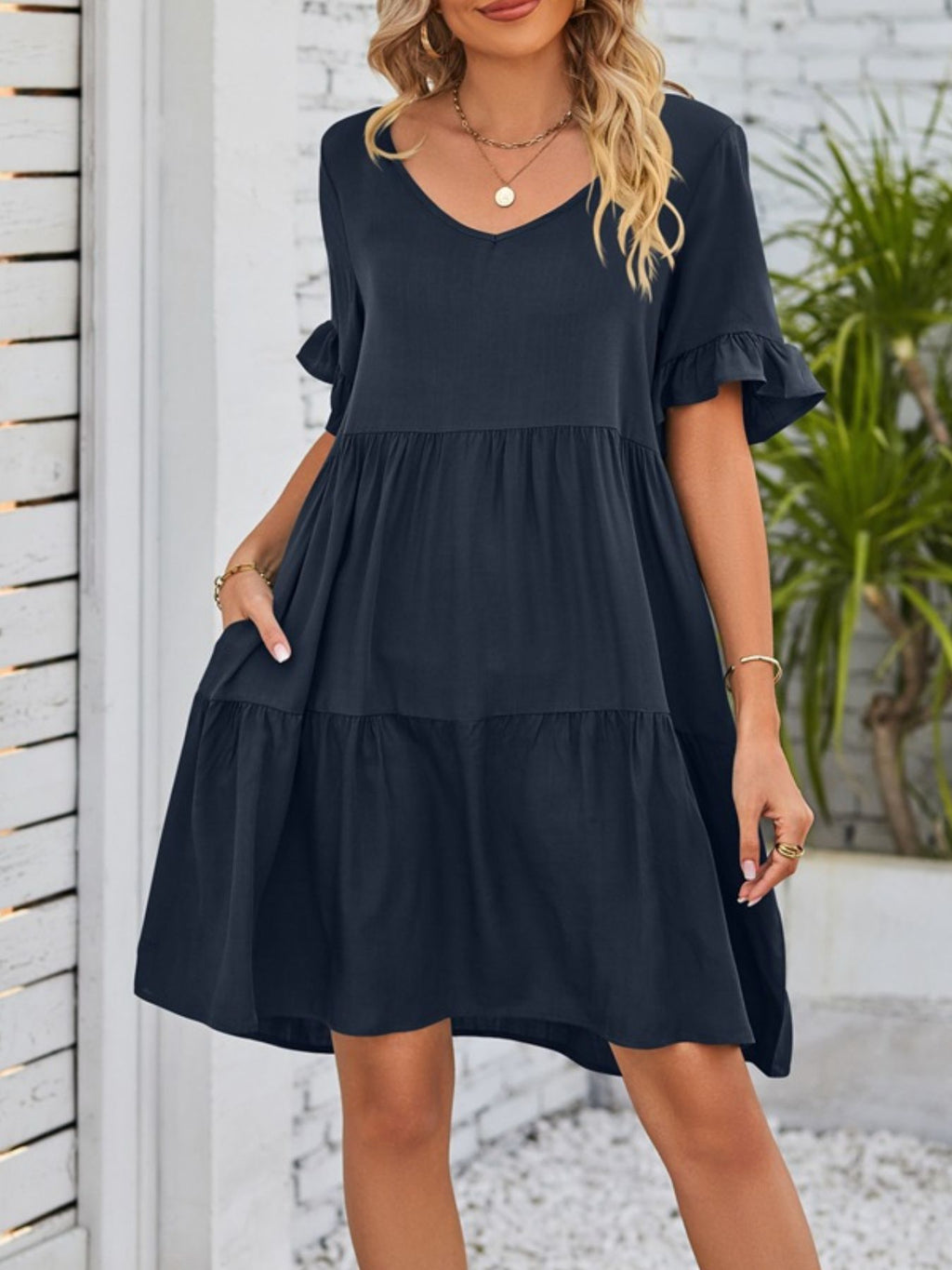 Lightweight rayon ruffled sleeve tiered mini dress with pockets, stylish and comfortable from Trendsi.