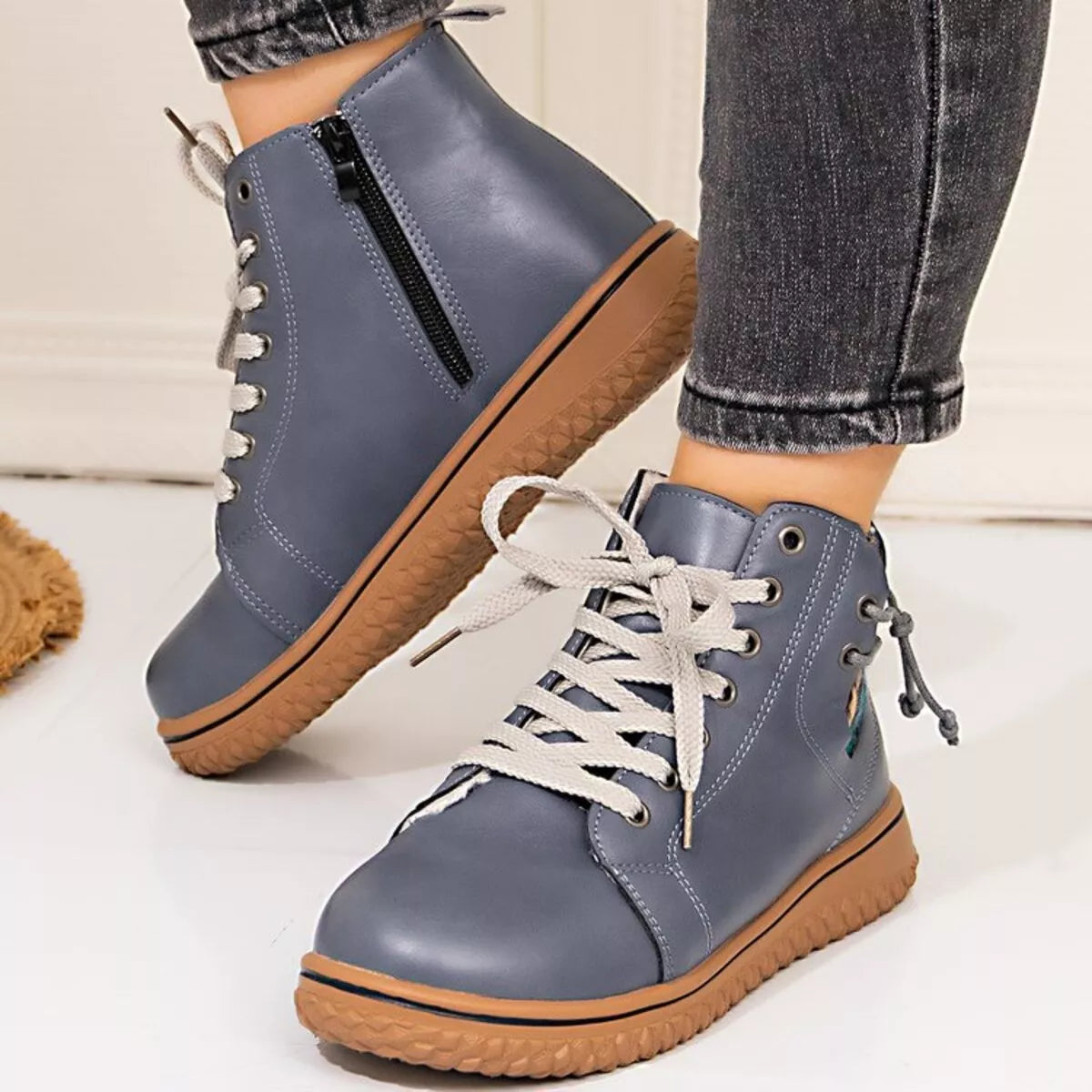 Women's round toe platform ankle boots by Trendsi, stylish black shoes with chunky heels and ankle height.