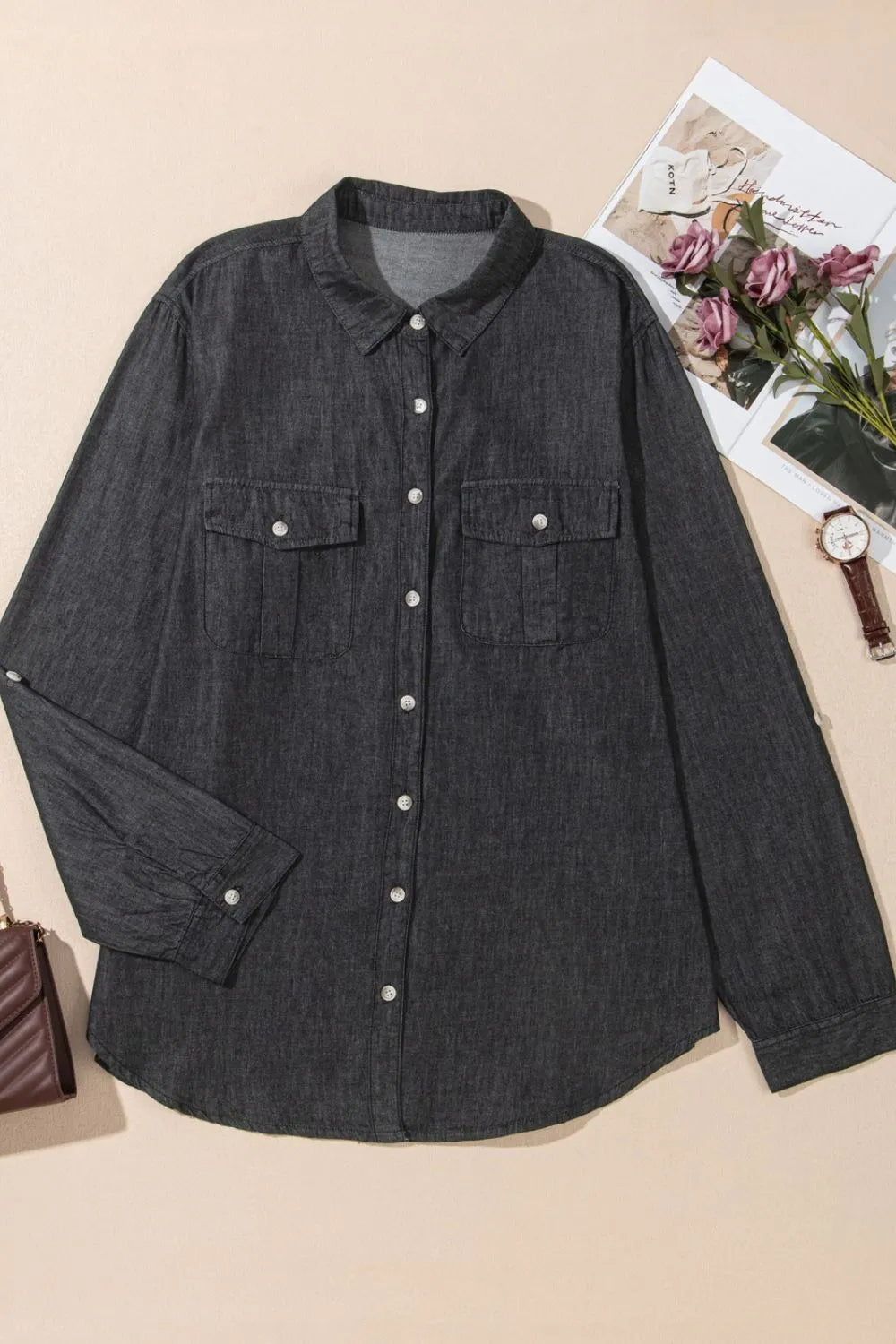 Denim top with long sleeves, collared neck, and front pockets, stylish denim shirt by Trendsi displayed in the image.