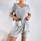 Women’s ribbed knit V-neck tee and shorts lounge set by Plush Fashion Hub, featuring a casual, comfortable fit and soft fabric.