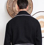 Back view of Lotus Linen premium black waffle piping robe for men, showing small size and stylish piping details.