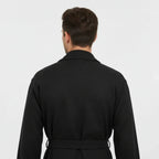 Black Lotus Linen men's waffle spa bathrobe viewed from the back, lightweight and absorbent for comfortable lounging.