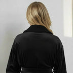 Soft black women's plush bathrobe by Lotus Linen, showing the back view with small size and cozy fabric details.