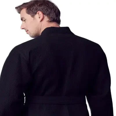 Black Lotus Linen waffle spa bathrobe for men, lightweight and absorbent, shown from the back.