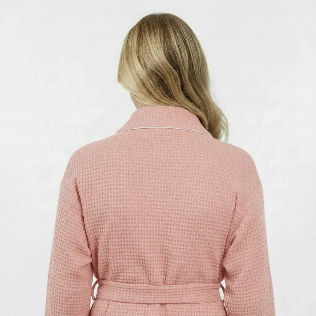 Lightweight blush waffle robe for women with piping, quick-dry spa comfort, from Lotus Linen, shown from the back.