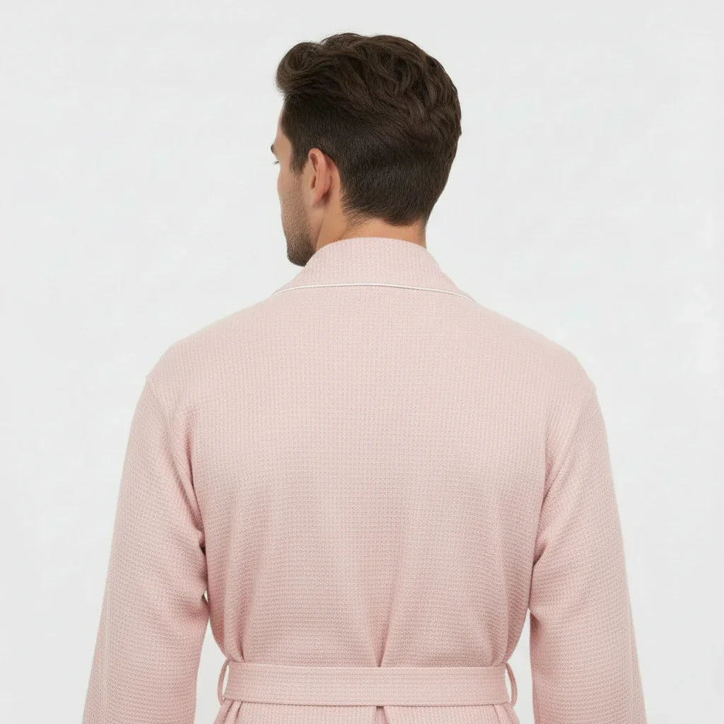 Back view of Lotus Linen men's premium waffle piping robe in blush, showcasing soft fabric and piping details.