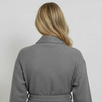 Lightweight charcoal women's waffle robe from Lotus Linen, quick-dry spa comfort, shown from the back.