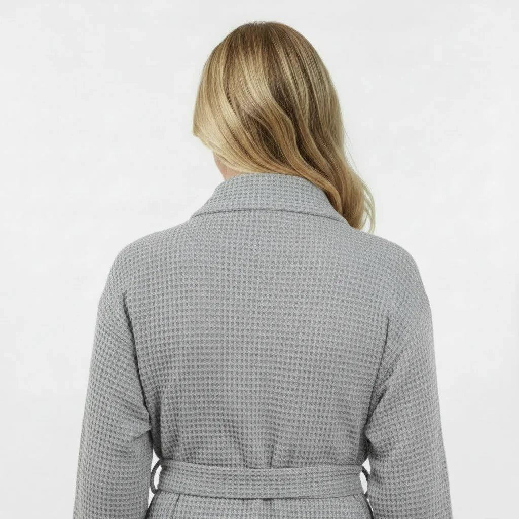 Gray women's waffle robe by Lotus Linen, lightweight and quick-drying, shown from the back with a small size fit.